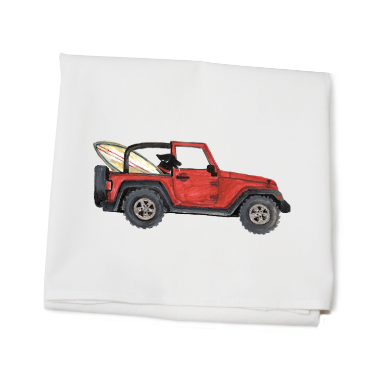 lab in red jeep + board flour sack towel